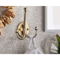 Oval Tri Hook - Antique Brass -Famous Furniture Store 12839037 1894995166004241